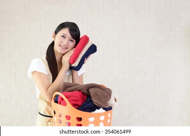 Woman With A Laundry Basket