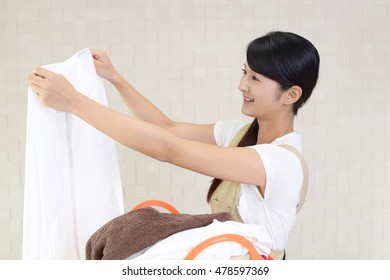 Woman With A Laundry Basket 