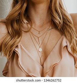 Woman In Layered Necklace