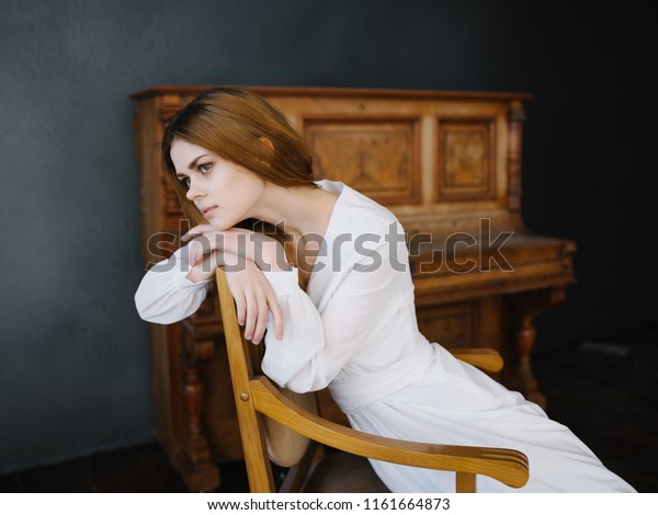 Woman Leaning Her Elbows On Wooden Stock Photo Edit Now