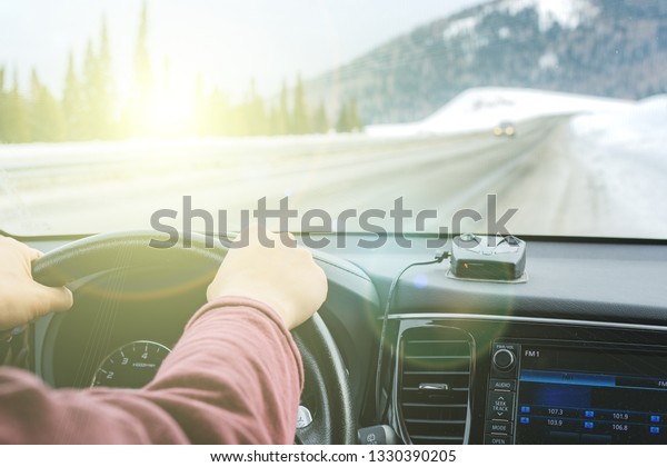woman learning to drive a car in a sunny day on\
the highway