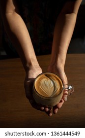 Woman Learning To Make Latte Art.