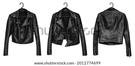 Woman leather jacket design concept on hanger holding in hand front view isolated on white background
