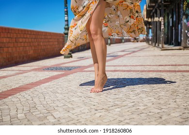 Woman Legs, Barefoot Girl Waving Stylish Long Dress in town