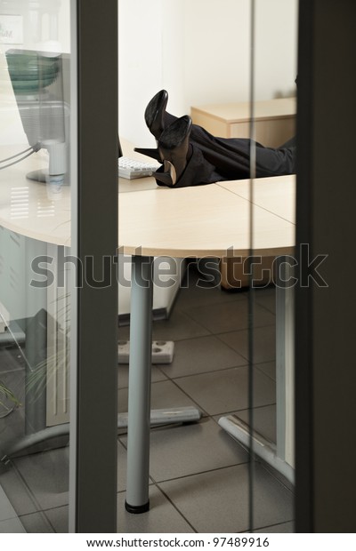 Woman Legs On Desk Through Office Stock Photo Edit Now 97489916