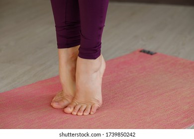 Woman Legs On Yoga Mat. National Yoga Day