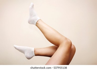 Woman Legs In White Socks