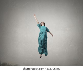 Woman Levitating In Air . Mixed Media