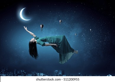 Woman levitating in sky . Mixed media