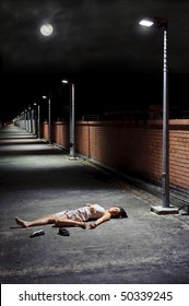 Woman Lies Vulnerable In The Vacant Street