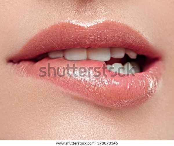 Woman lips mouth biting lip\
