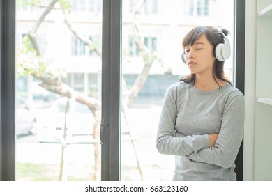 Woman Listening To Music 