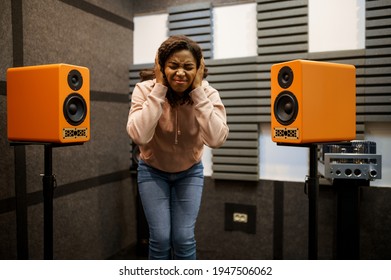 Woman Listens To Loud Music, Speaker System Store