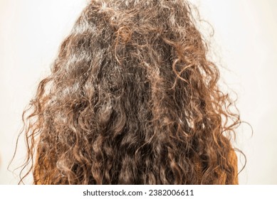 woman with long curly hair
