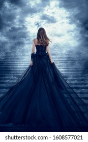 Woman in Long Dress Back Rear View Climbing Stone Stairs to Sky, Girl Raising Mystic Dark Night Way