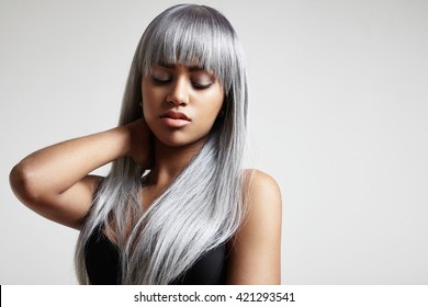 woman with a long grey hair. creative color hair