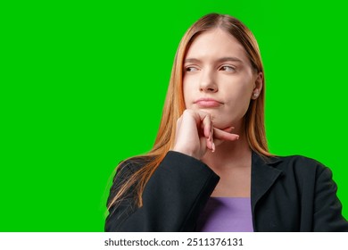 Woman With Long Hair Contemplating While Posing Against a Green Screen - Powered by Shutterstock