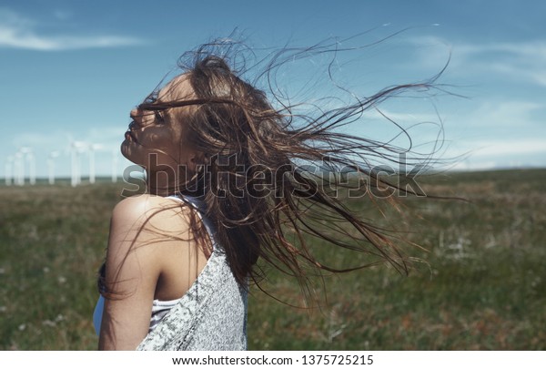 Woman Long Tousled Hair Next Wind Stock Photo Edit Now 1375725215
