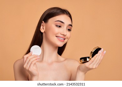 Woman Look At Mirror And Holding White Cotton Pad