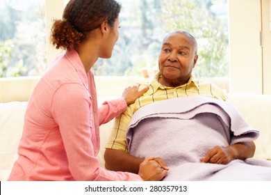 Woman looking after sick father - Powered by Shutterstock