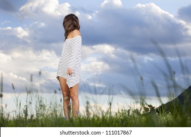 Woman Looking Back Over Her Shoulder