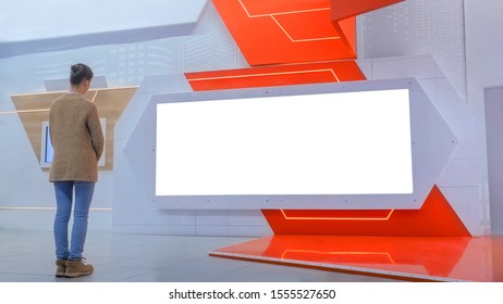 Woman Looking At Blank Large Wide Interactive Wall White Display At Modern Technology Exhibition Or Museum With Futuristic Sci-fi Interior. Mock Up, White Screen, Template, Education, Isolated Concept