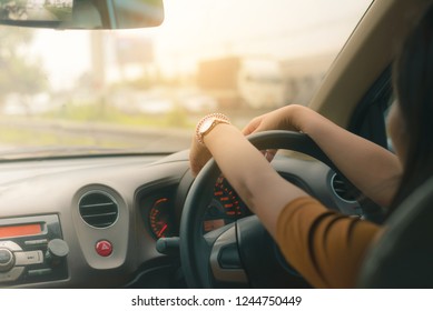  Woman Looking Bored In Her Own Car While Getting Stuck In Traffic Jam.