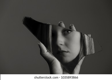 Woman Looking At Her Face In A Shard Of An Broken Mirror Artistic Conversion