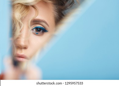 Woman Looking At Her Self Reflected In A Mirror, Selfie, Vanity, Conceit, Ego, Digital Narcissism Concept Minimal Flat Design. An Illusion, Beautiful Girl With A Mirror In Her Hands