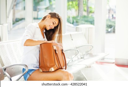 Woman Looking Inside Her Bag