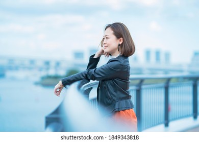 Woman looking into the distance - Shutterstock ID 1849343818