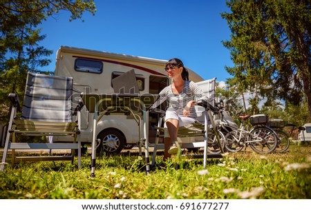 Similar – Image, Stock Photo Woman standing in ladder opening tent over car