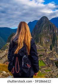 Woman Looking Machu Picchu Incan Site, Over-the-shoulder Shot