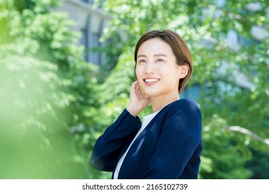 Woman Looking Up At The Sky (business Woman)