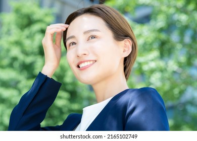 Woman Looking Up At The Sky (business Woman)