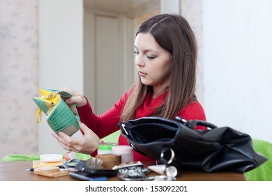 Woman Looking For Something In Her Purse