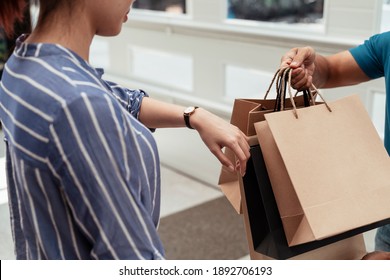 Woman Looking At Watch On Hand, Checking Delivery Time. Late Delivery.