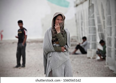 A woman looks on at Eleonas refugee camp in Athens, Greece on Apr. 9, 2016