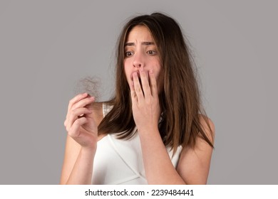 Woman loosing hair. Hair loss problem, baldness. - Shutterstock ID 2239484441
