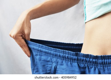 Woman Lose Weight , Diet Concept Background