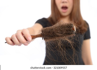 Woman Losing Hair On Hairbrush Isolated On White