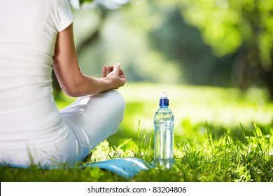 Woman in lotus position close-up