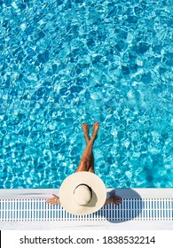 Woman In Luxury Five Stars  Spa Resort In The Swimming Pool. 