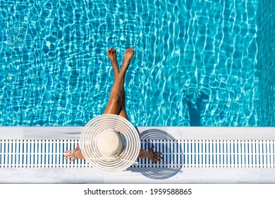 woman in luxury five stars  spa resort in the swimming pool. 
