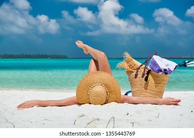 Woman Lying Down On Beach. Summer Vacation At Maldives.