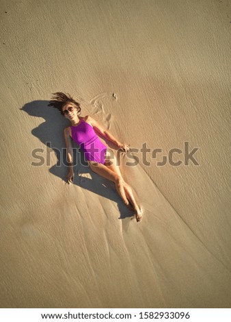 Similar – Woman lying down on a road after accident