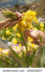 Woman Lying In A Field Of Cuckoo Flowers