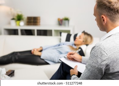 Woman lying on couch at doctors office - Powered by Shutterstock