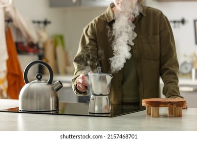 Woman Make A Coffee In Moka Pot In Kitchen