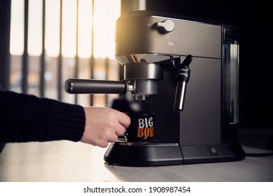 Woman Make Espresso Coffee In Kitchen